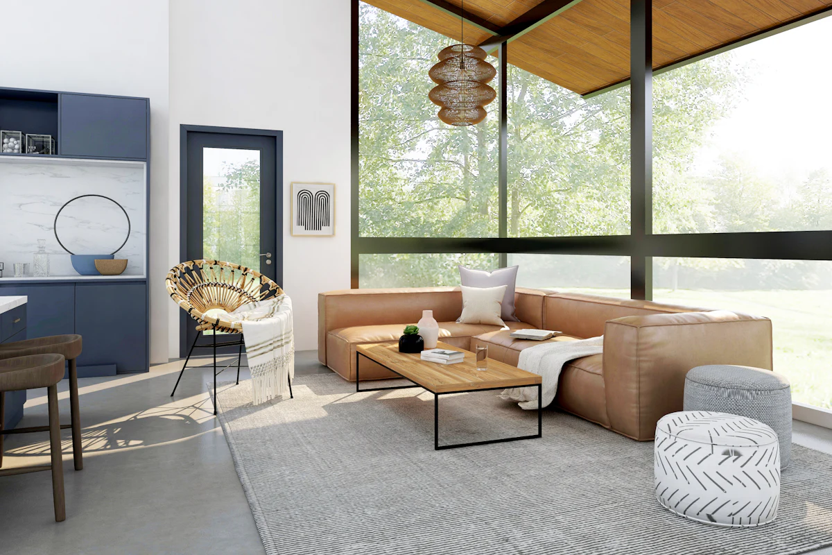 A living room with a wood-clad ceiling, tall windows and a leather sofa